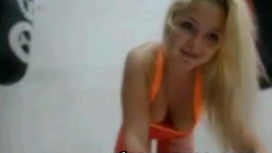 Blonde sexy teen makes hot exercises at gym